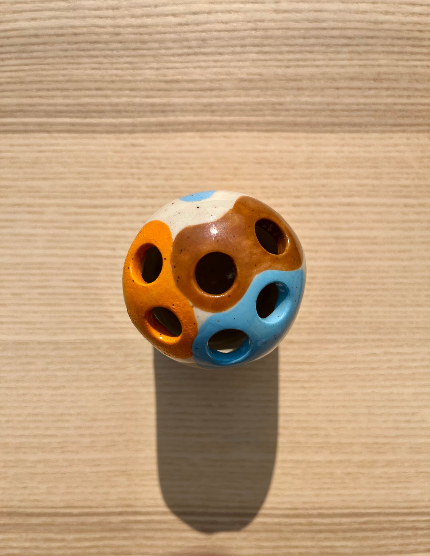 Orange, Blue, and Brown Lined Bud Vase