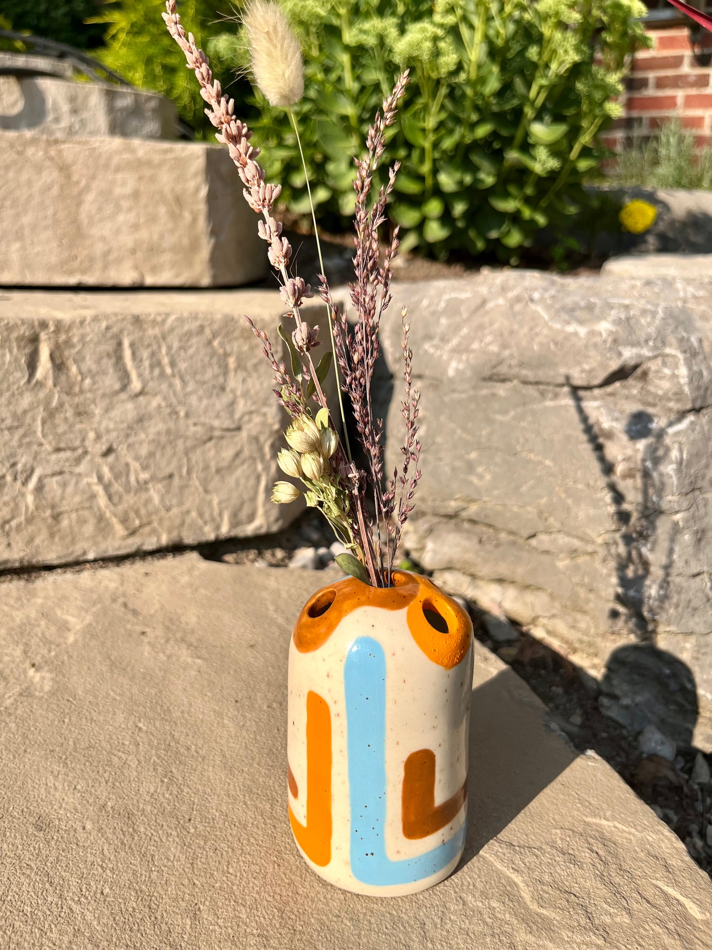 Orange, Blue, and Brown Lined Bud Vase
