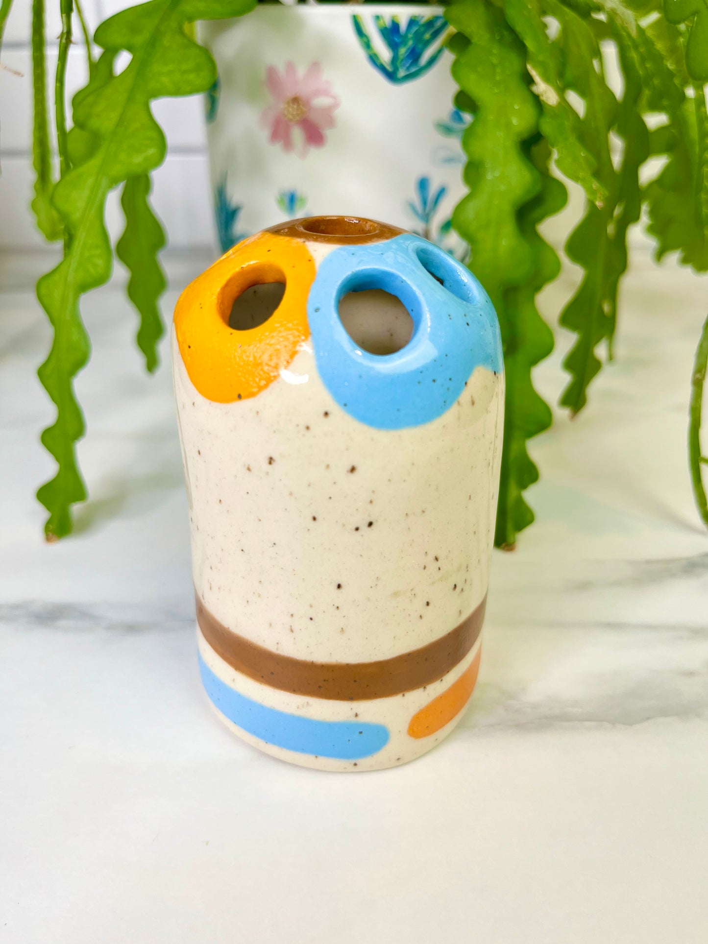 Orange, Blue, and Brown Lined Bud Vase