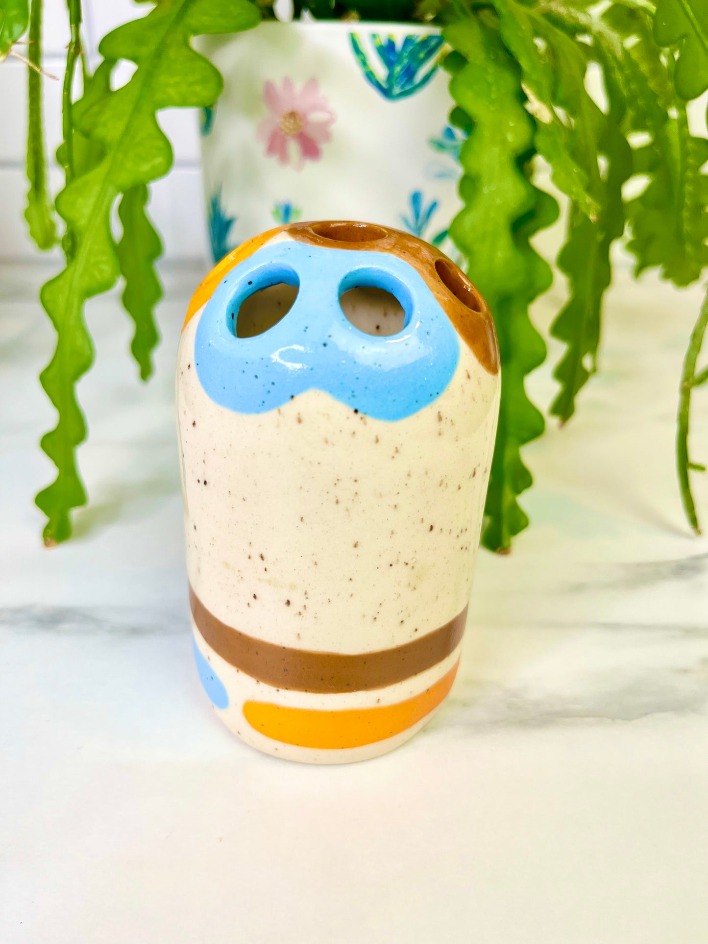 Orange, Blue, and Brown Lined Bud Vase